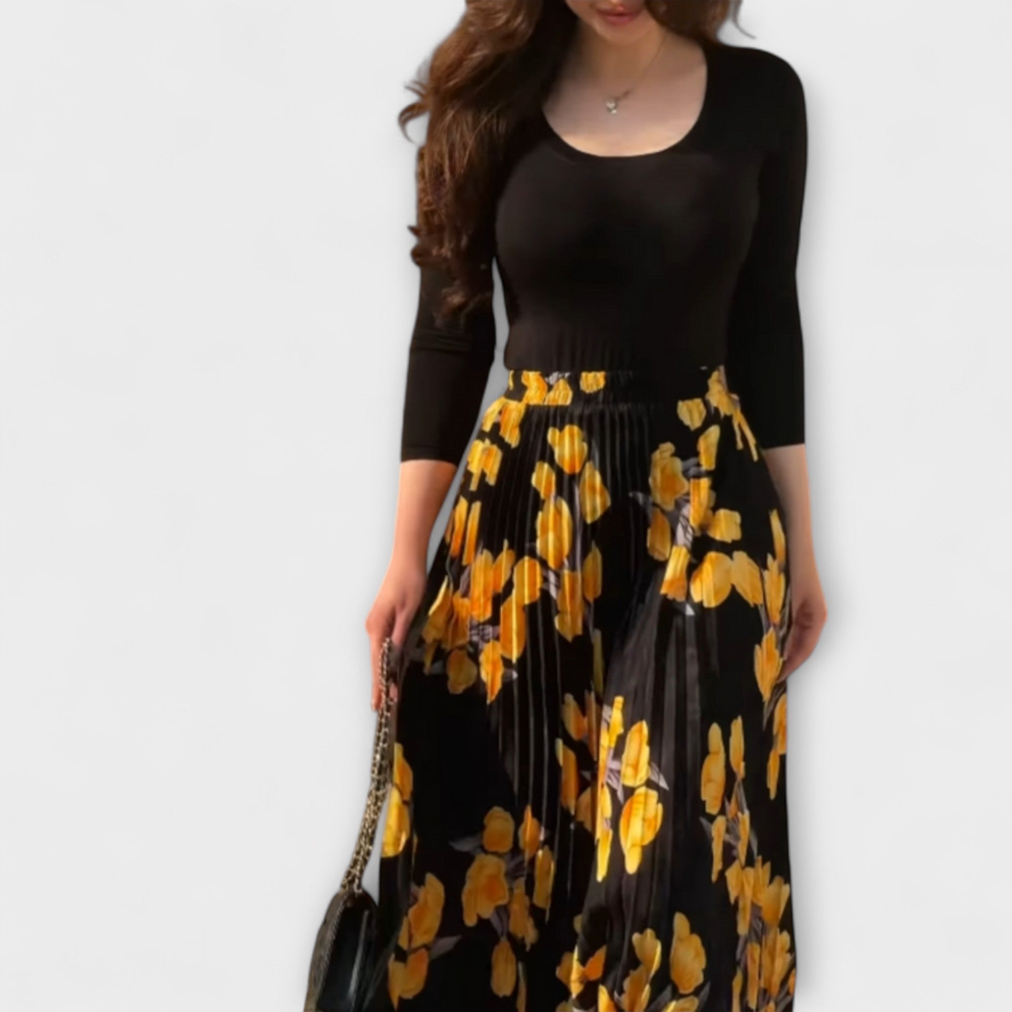 ויולט - חצאית קפלים וסט