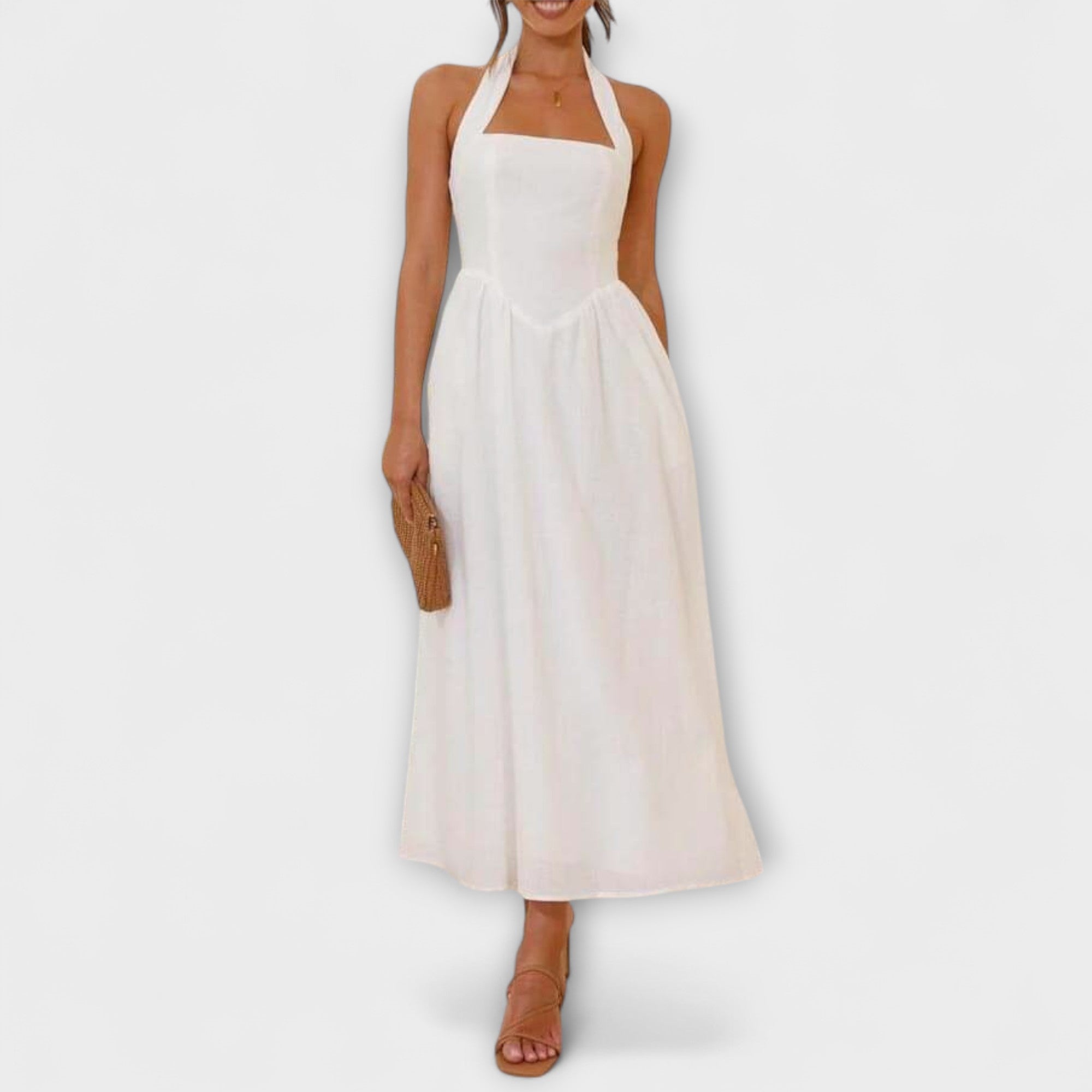 לידיה - שמלת הולגר שחורה באורך בינוני עם פרטי מותן